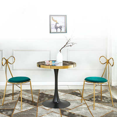 Butterfly-shaped golden leg dining chair